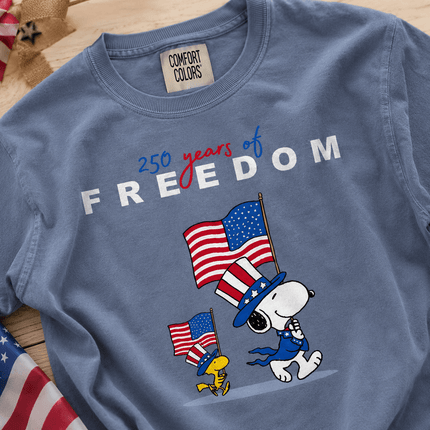 1_6119bf1e-4eea-4531-8ca5-a008433ecca3 - AuraNations - Comfort Colors 250 Years Of Freedom Patriotic Waving Flags Dog T-Shirt - Blue Jean / S - 250TH ANNIVERSARY, ALL, COMFORT COLORS, NO CUSTOM, PRODUCTS, SNPY, TSHIRT