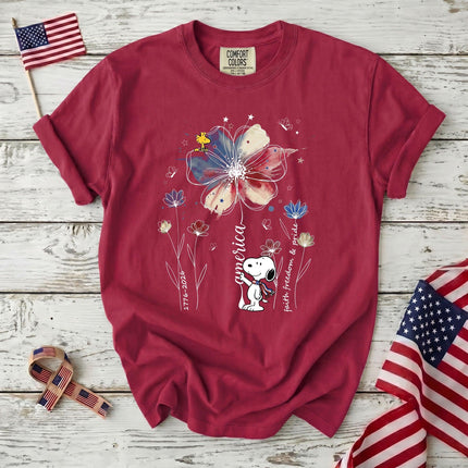 CRIMSON_eb7e27eb-1f47-4e35-aab6-6b60e7f691af - AuraNations - Comfort Colors America Faith Freedom Pride Watercolor Flower Patriotic Dog T-Shirt - Crimson / S - 250TH ANNIVERSARY, ALL, COMFORT COLORS, NO CUSTOM, PRODUCTS, SNPY, TSHIRT