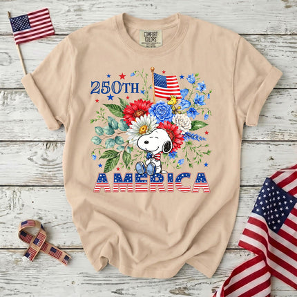 IVORY_1dd225ef-024a-4540-90ca-5c16d043c762 - AuraNations - Comfort Colors 250th America Patriotic Sitting Floral Dog T-Shirt - Ivory / S - 250TH ANNIVERSARY, ALL, COMFORT COLORS, NO CUSTOM, PRODUCTS, SNPY, TSHIRT
