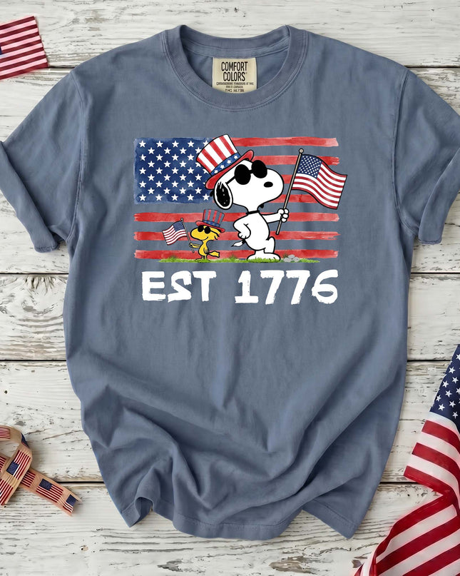 JEAN_624bcfe1-2cb0-424f-9a36-3ab8f5f1d0b2 - AuraNations - Comfort Colors Est 1776 Patriotic Flag Cool Waving Dogs T-Shirt - Blue Jean / S - 250TH ANNIVERSARY, ALL, COMFORT COLORS, NO CUSTOM, PRODUCTS, SNPY, TSHIRT